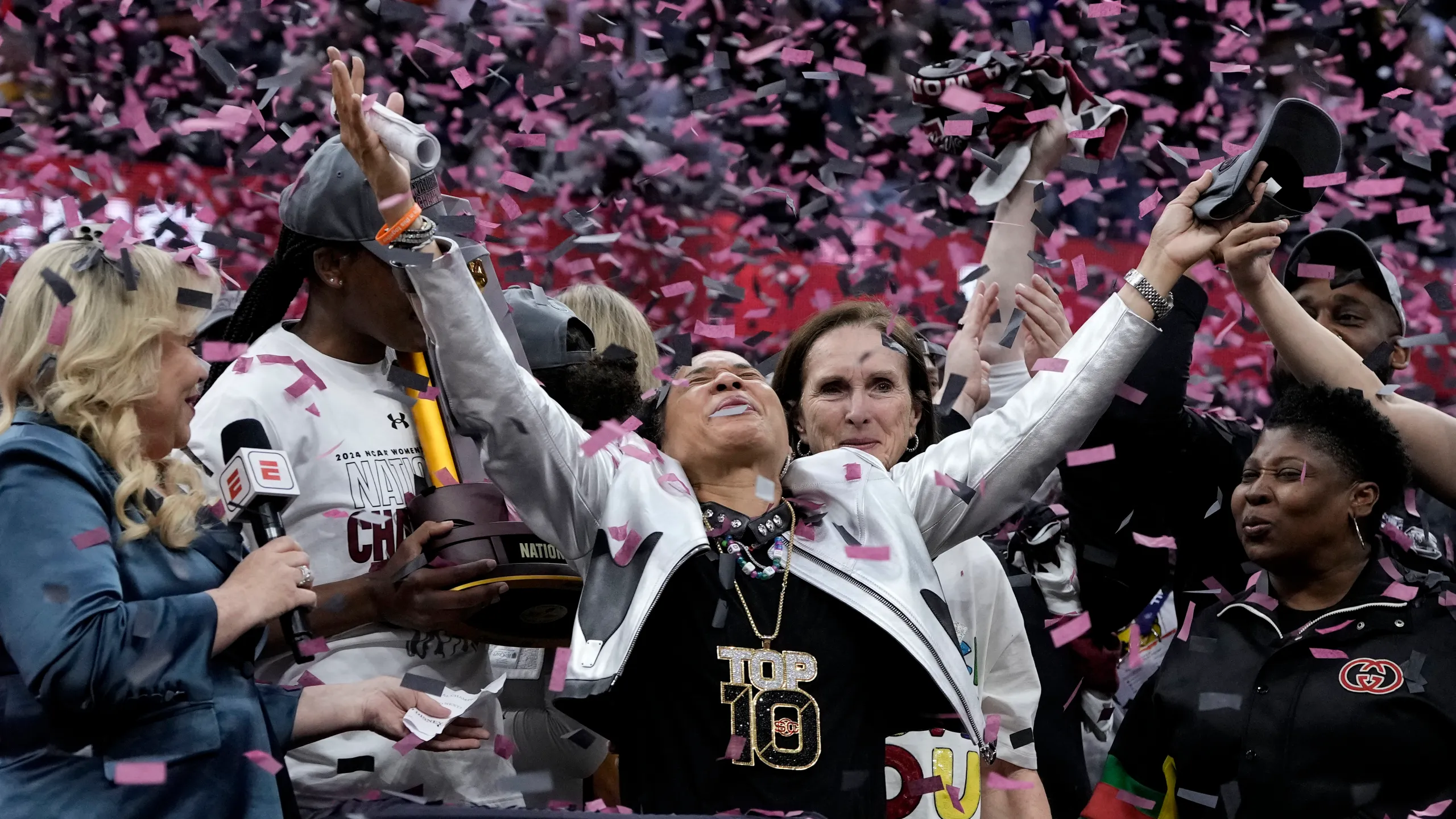 breaking news:The Iowa Hawkeyes celebrate after beating the UConn Huskies 71-69, in Cleveland, on Friday………