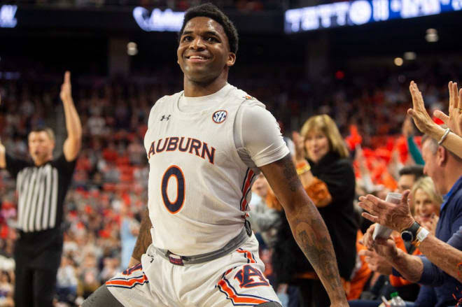 The Auburn Tigers rise to the top of the AP Poll, while CJ Johnson makes an unexpected comeback to Auburn football.