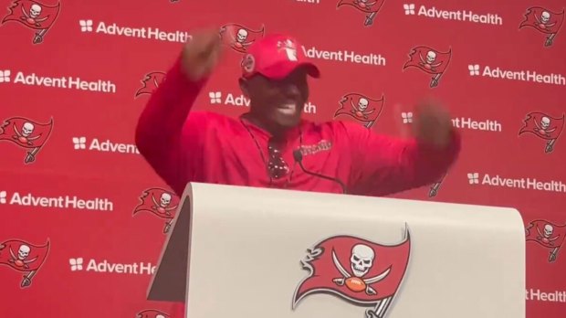 fired-up-buccaneers-coach-todd-bowles-pounds-fists-on-podium-during-press-conference-as-reporters-warn-youre-on-video